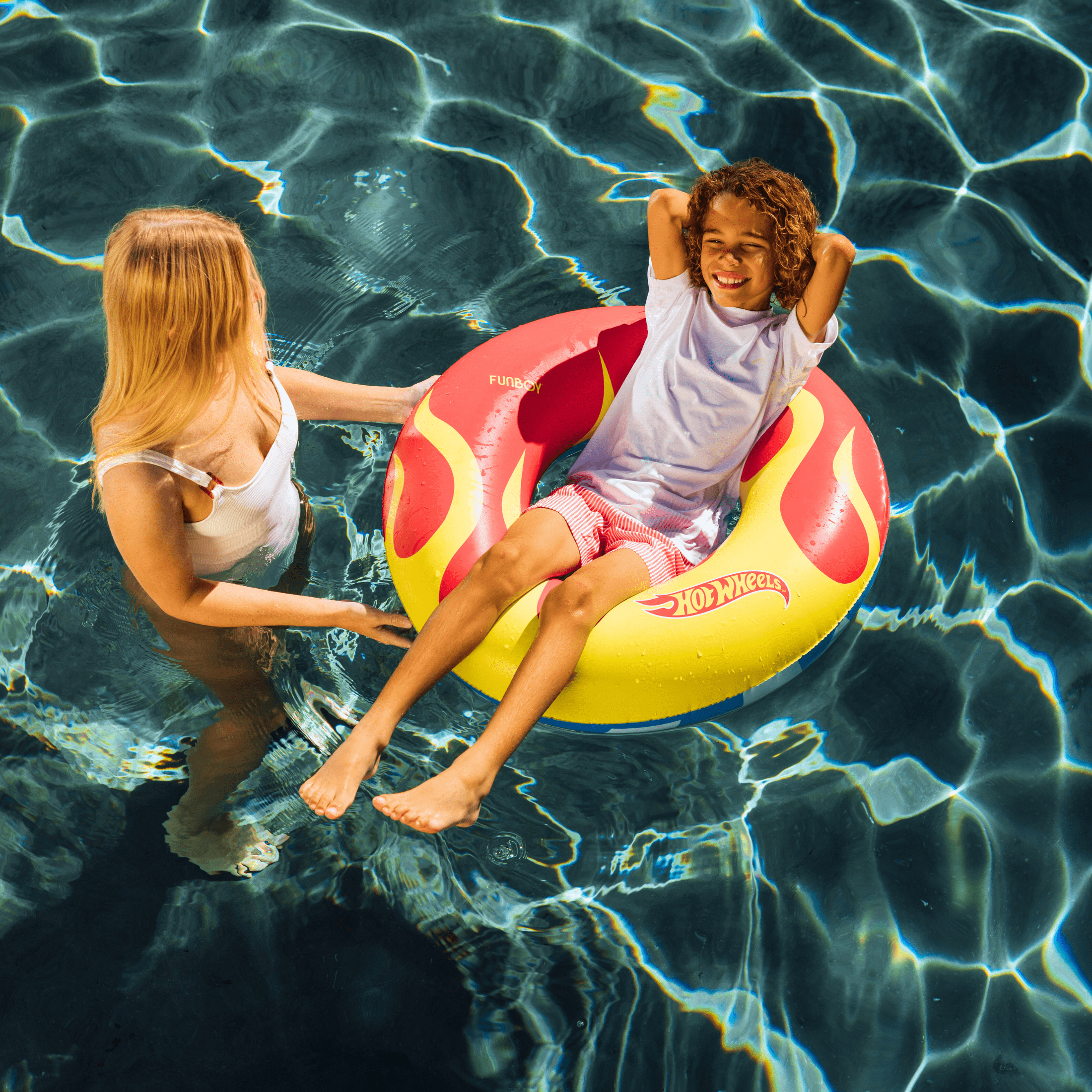 Hot Wheels™ by FUNBOY Double-Sided Checked and Flame Inflatable Tube, 34’’