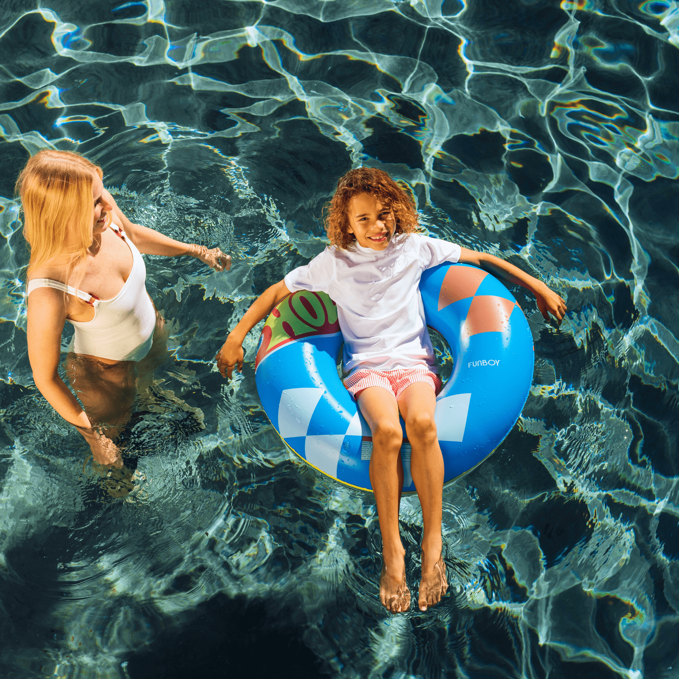 Hot Wheels™ by FUNBOY Double-Sided Checked and Flame Inflatable Tube, 34’’